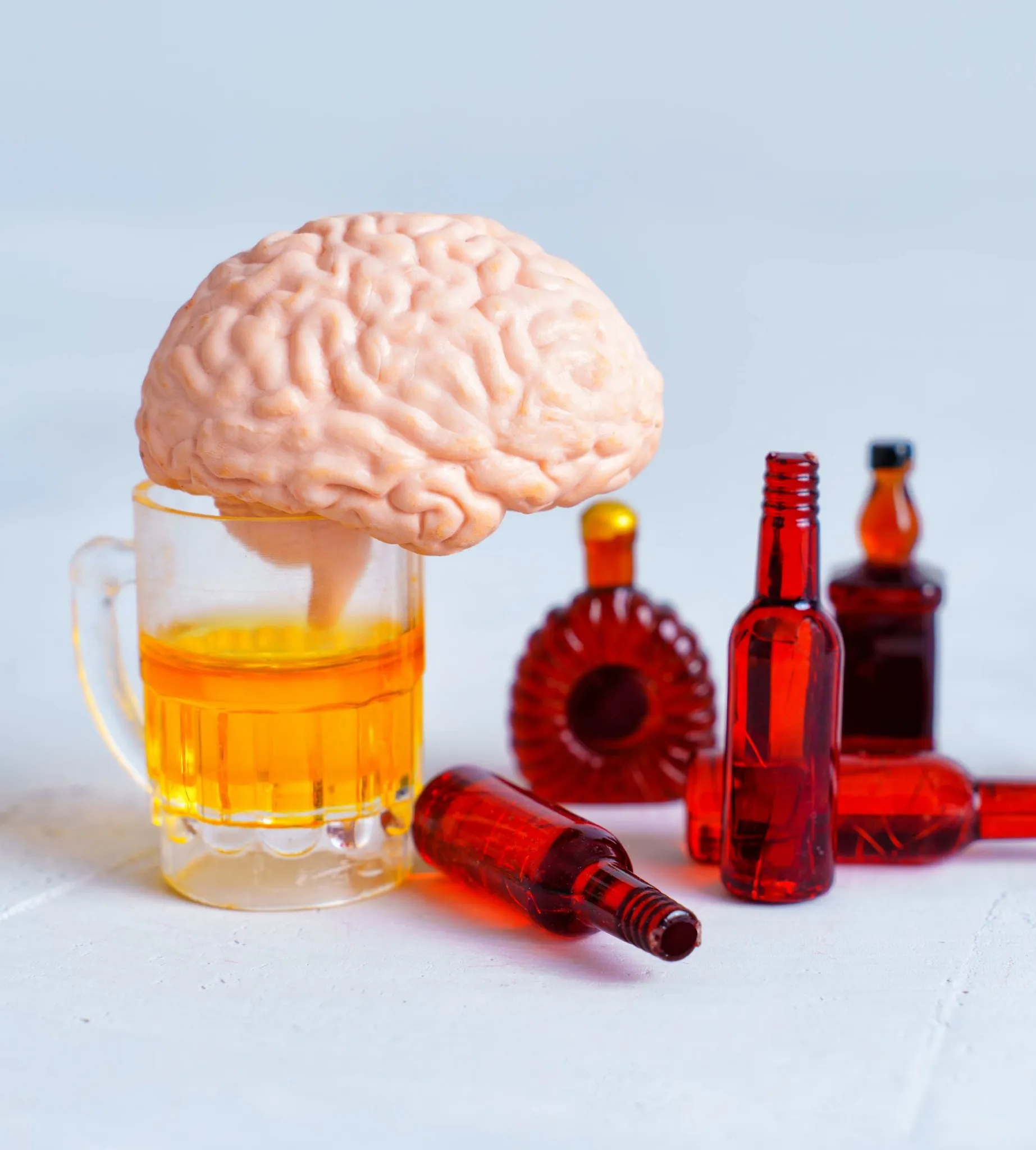 Brain and a glass of alcohol