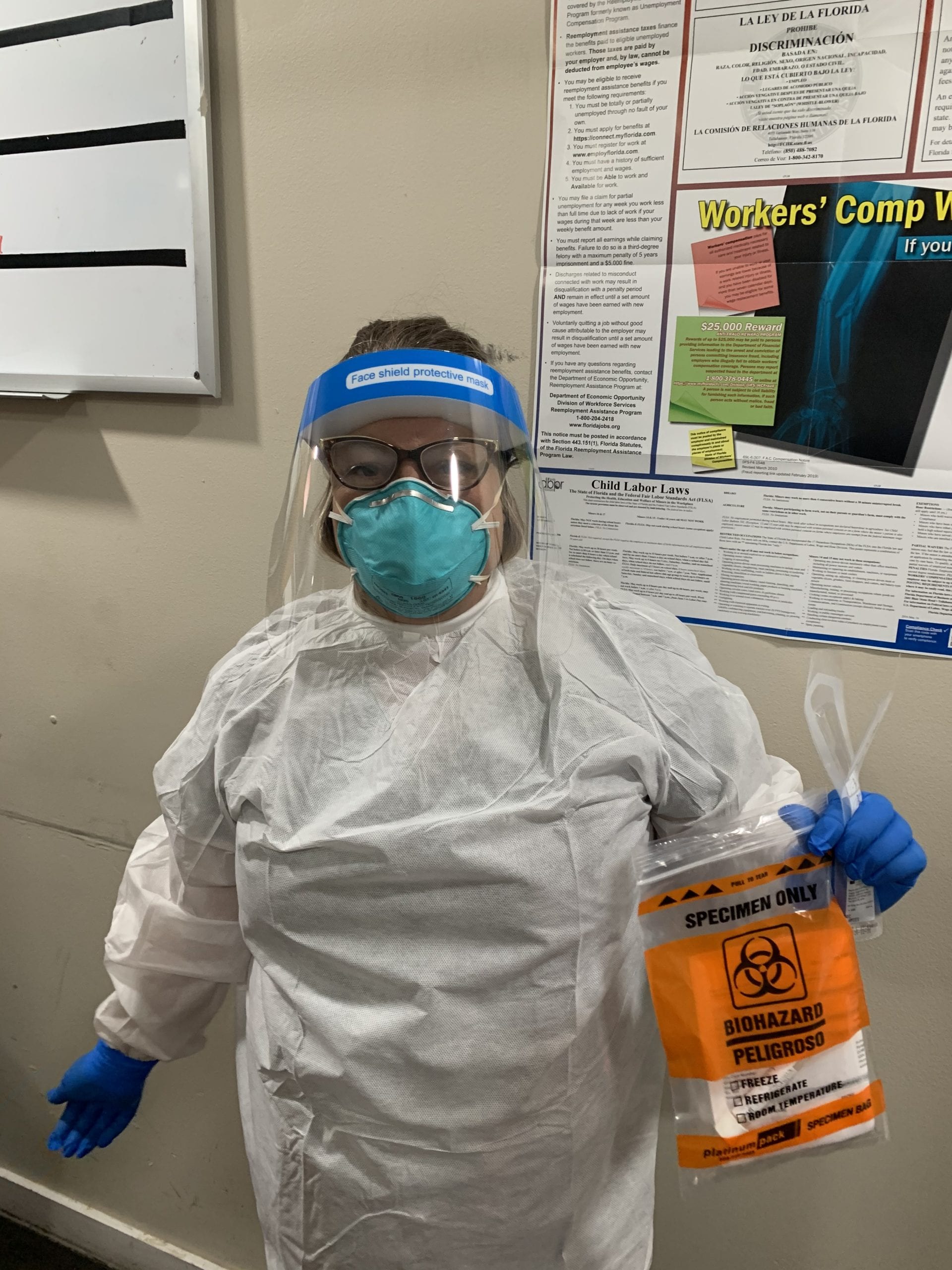 Stacy Riordan dons PPE for COVID-19