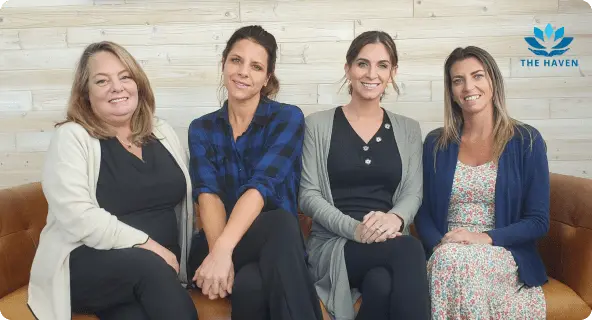 group of therapists sitting on a couch