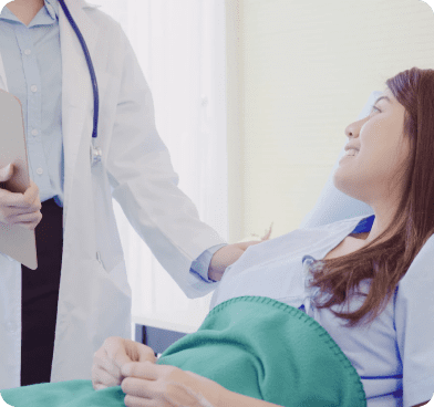 woman speaking to doctor
