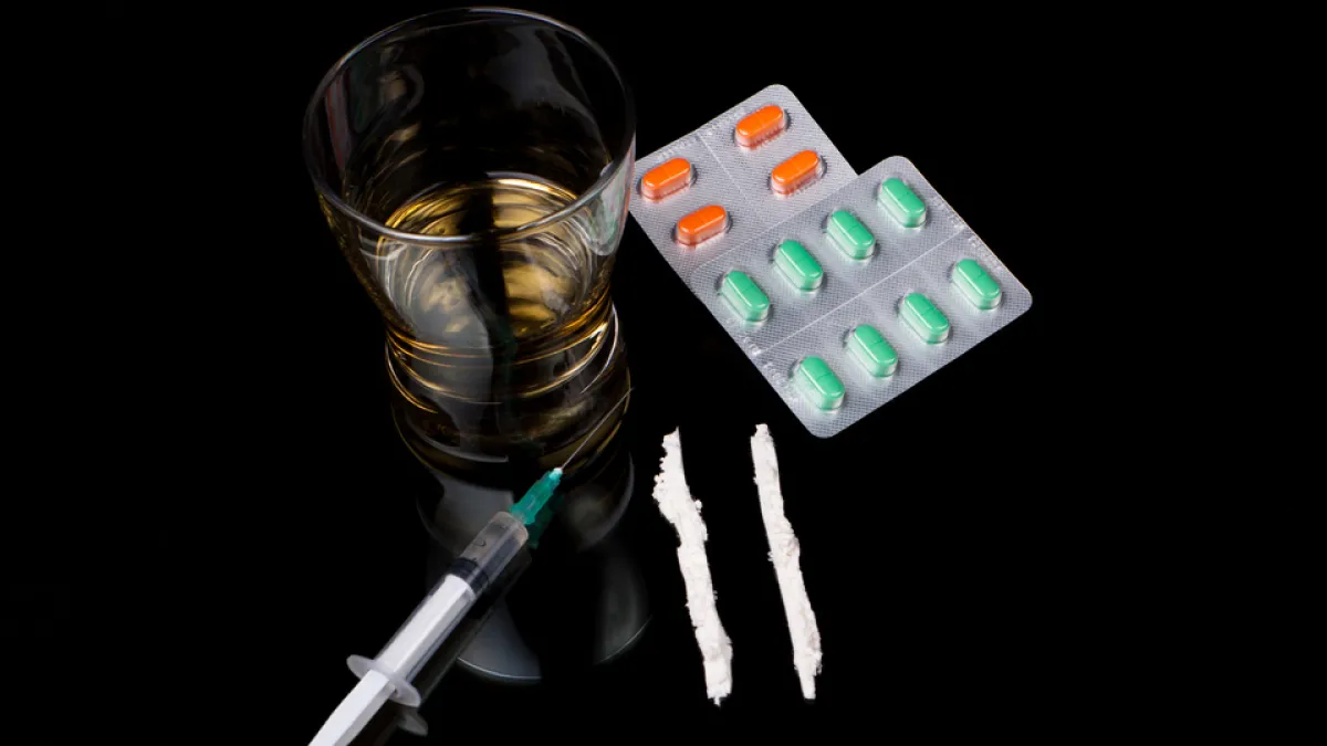 Whisky, prescription pills, and lines of cocaine. Drink responsibly and never mix alcohol with drugs, as it can have unpredictable effects