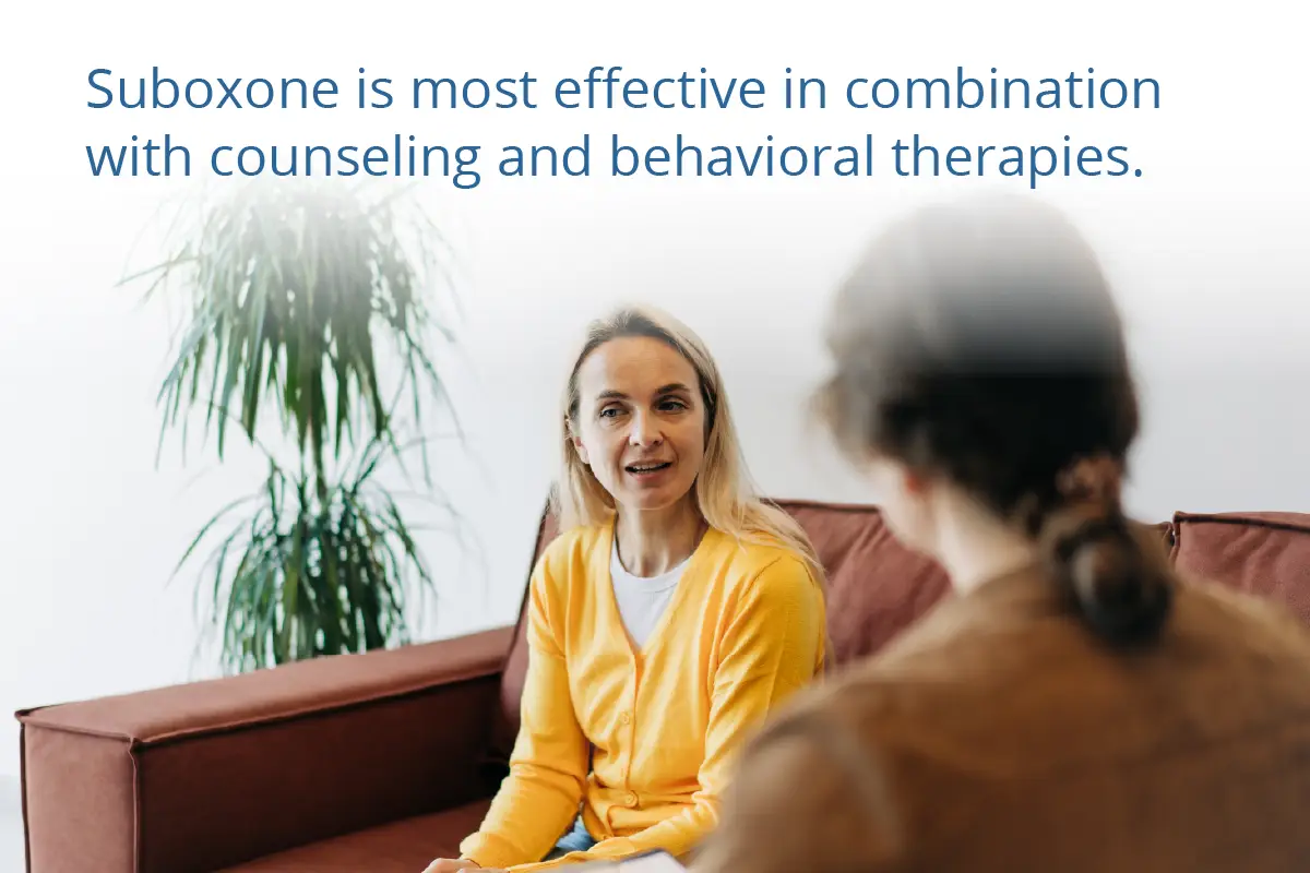 woman talking to her therapist on a couch