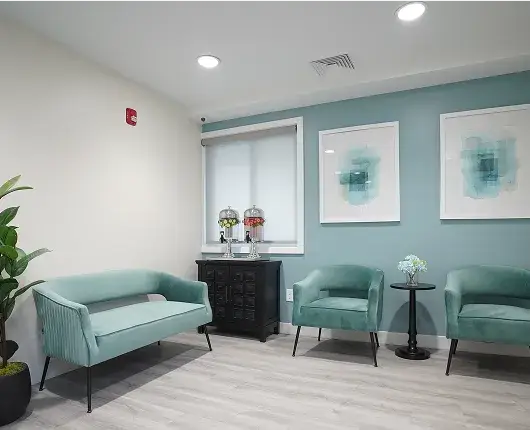 Community therapy room with couches at The Haven Detox in Little Rock, Arkansas