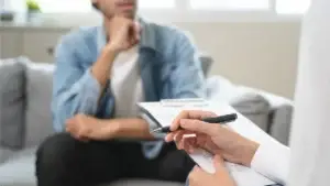 man talking to his nurse