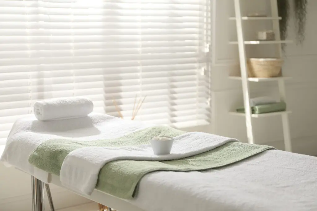 Patient receiving Reiki energy healing therapy as part of holistic addiction recovery at The Haven Detox