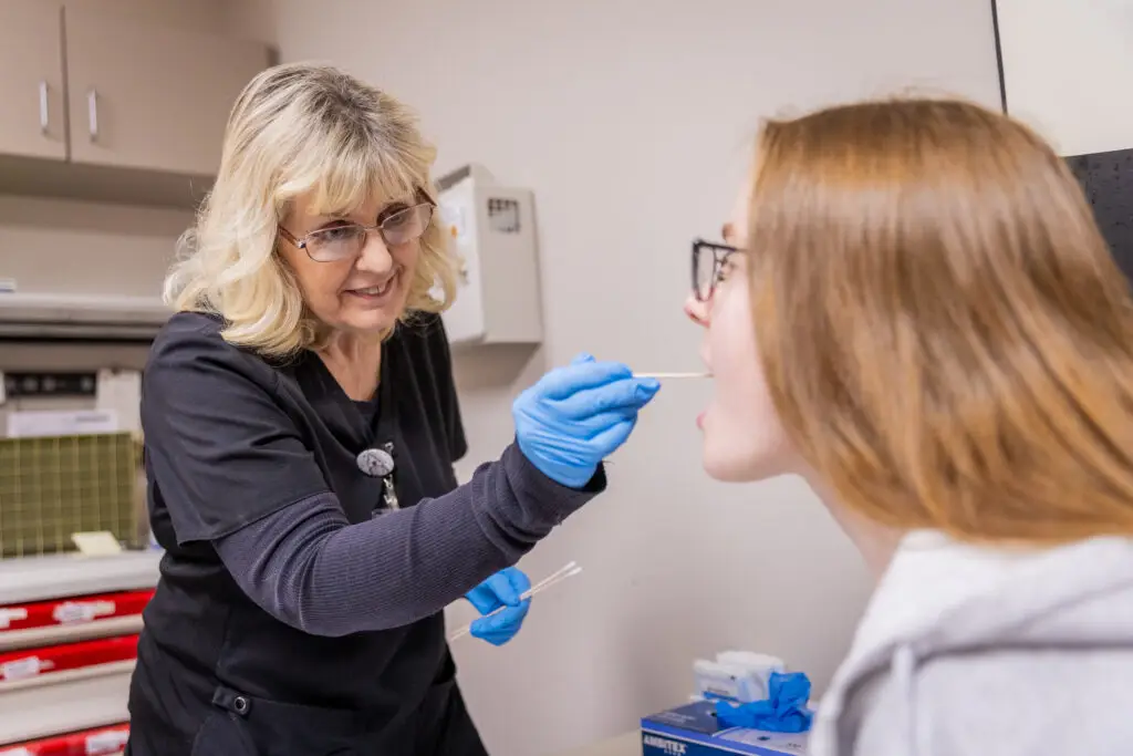 Nurse administering GeneSight genetic test to patient for personalized addiction and mental health treatment at The Haven Detox