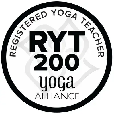 Black and white circular badge with text 'Registered Yoga Teacher RYT 200 Yoga Alliance