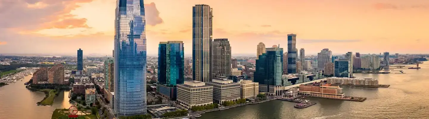 Cityscape with skyscrapers, partly cut off.