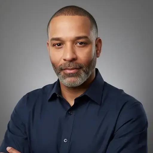 Professional headshot of a male healthcare team member at The Haven Detox Florida wearing a navy button-down shirt