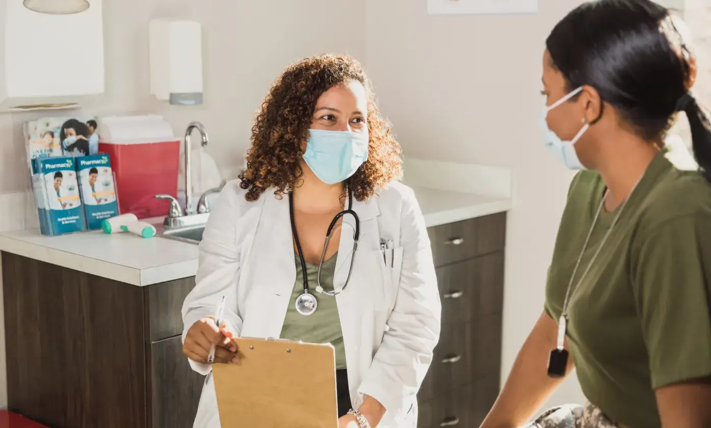 Doctore Speaking with Patient