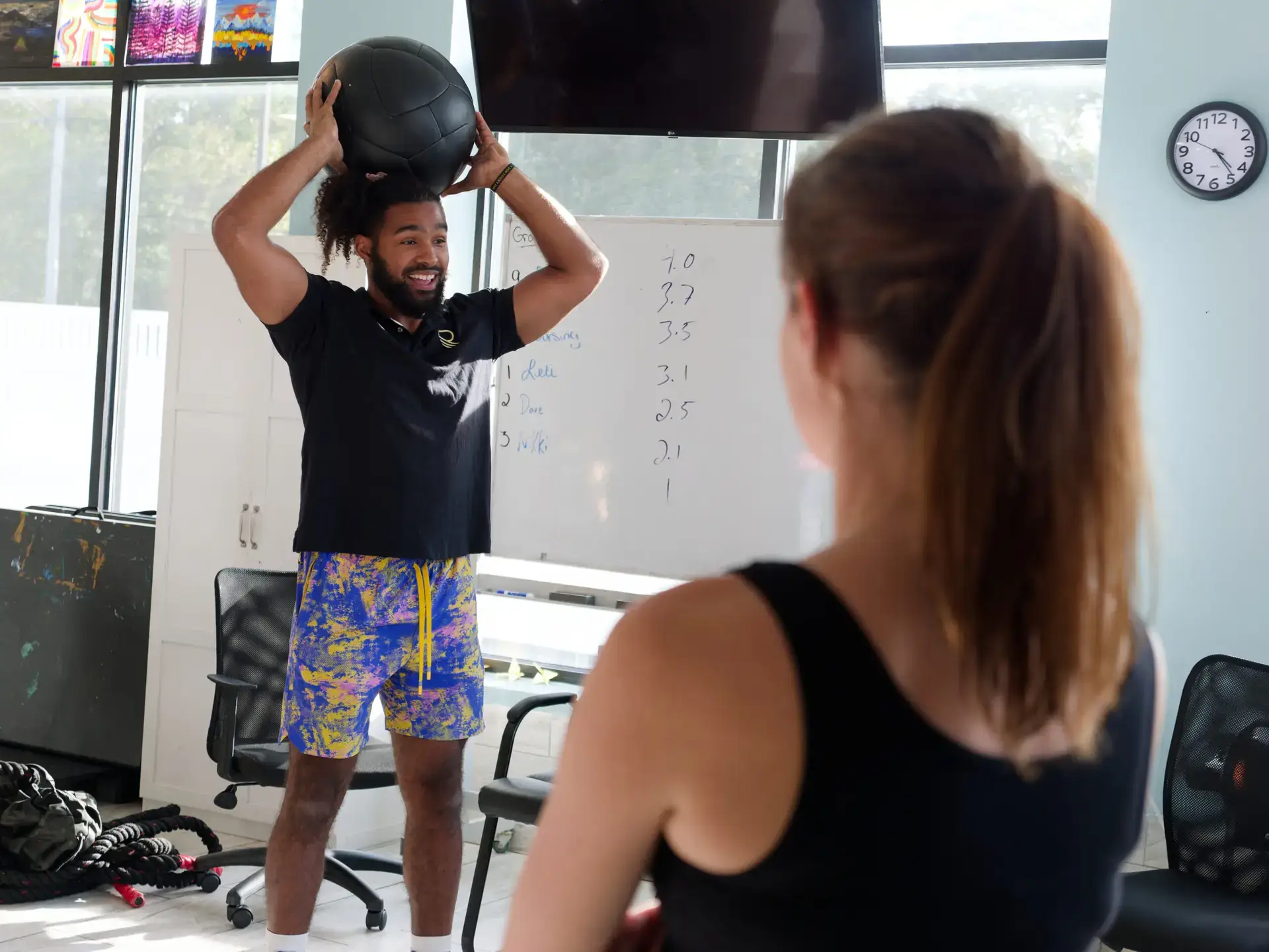 Fitness instructor leading a wellness exercise session with a patient at The Haven Detox Massachusetts in Worcester, Massachusetts.