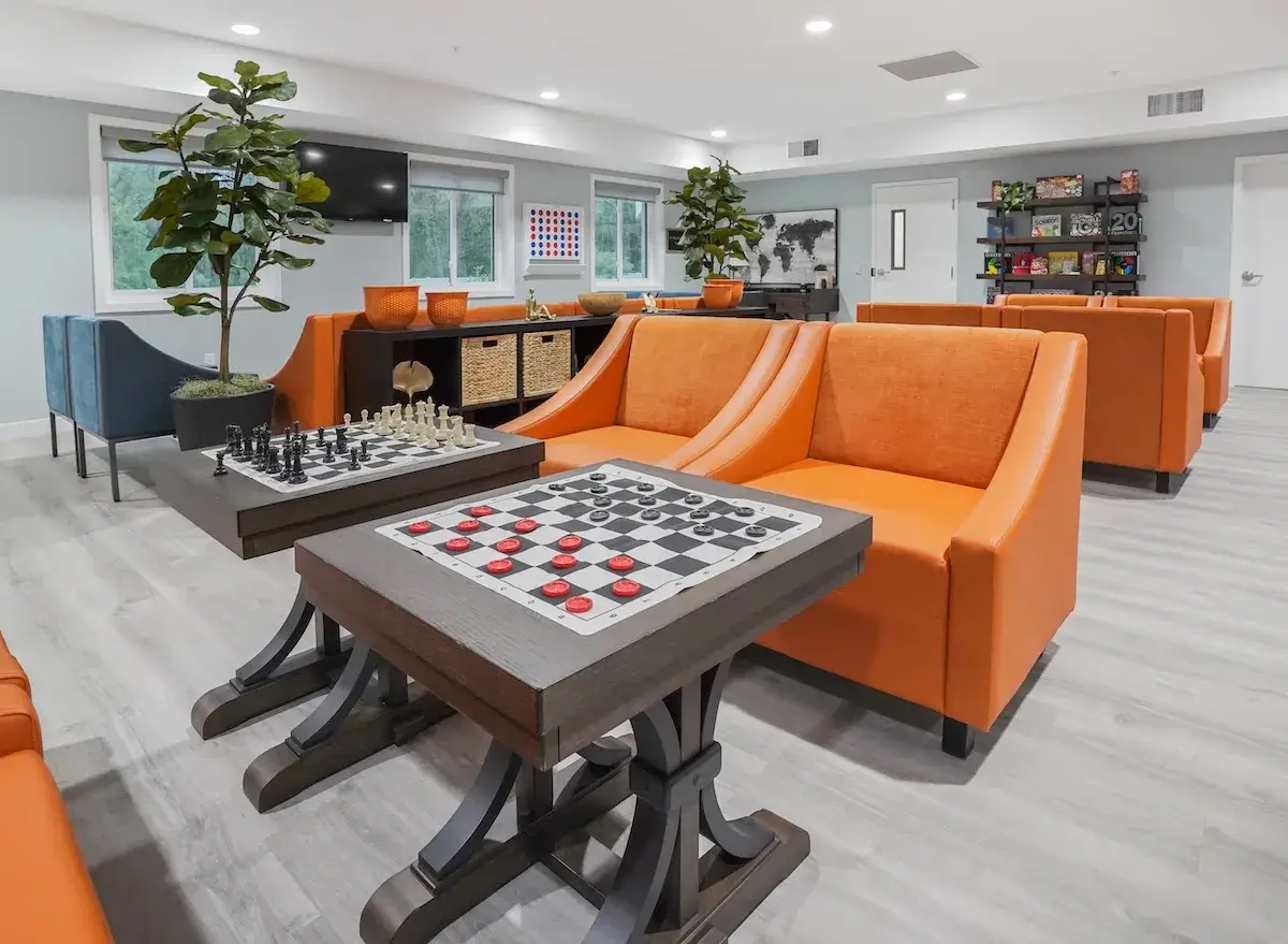 Recreation lounge with board games and seating at The Haven Detox New Jersey in Blackwood, New Jersey.